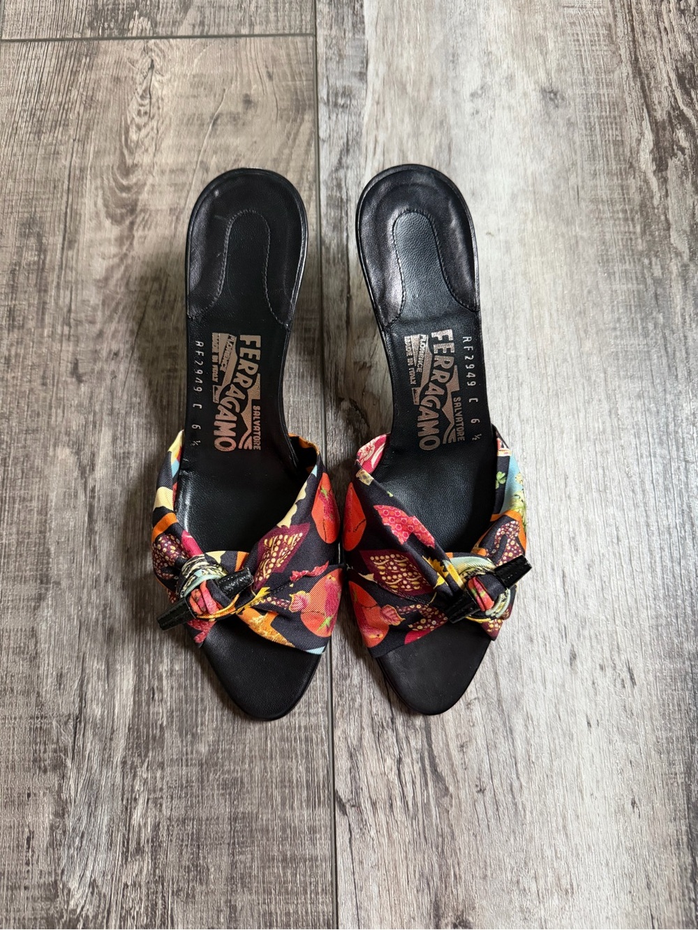 Salvatore Ferragamo Black Mules with Multicolor Floral Knot Strap